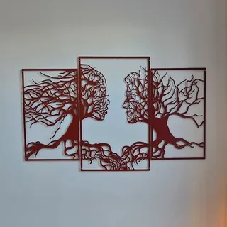 Œuvre murale représentant deux visages-arbres aux racines entremêlées, dans le cabinet
